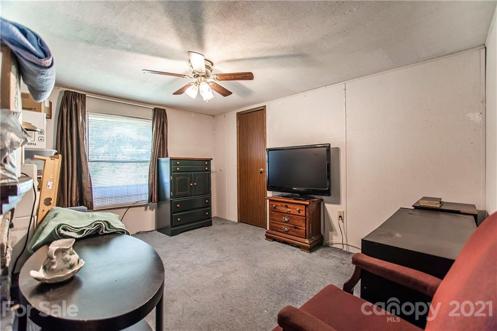 1481 Old Friendship Road Rock Hill, SC 29730 - Photo 17 of 23 a living room with furniture and a flat screen tv