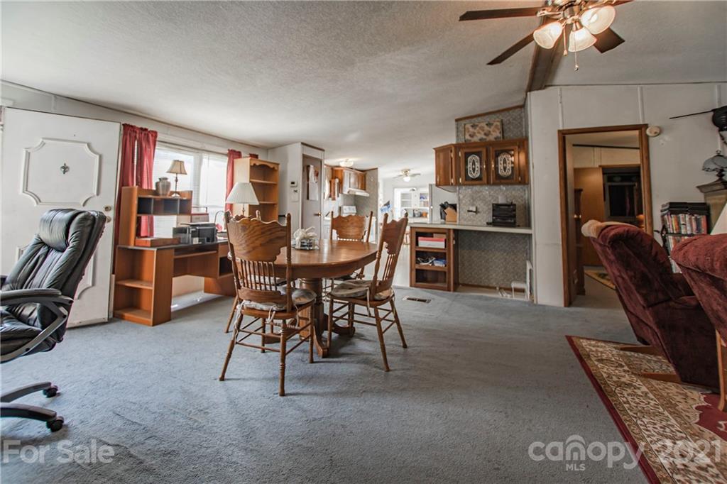 1481 Old Friendship Road Rock Hill, SC 29730 - Photo 3 of 23 a view of a livingroom with furniture and a flat screen tv