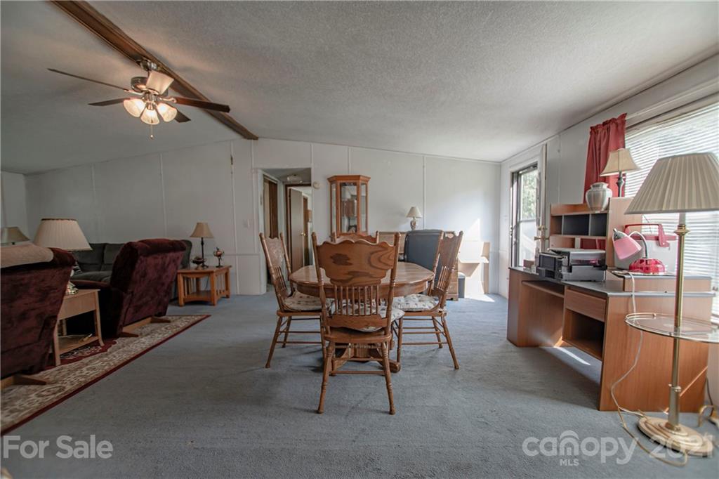 1481 Old Friendship Road Rock Hill, SC 29730 - Photo 4 of 23 a view of a dining room with furniture and a chandelier