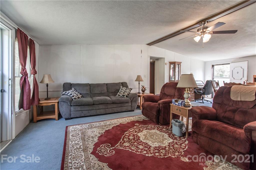 1481 Old Friendship Road Rock Hill, SC 29730 - Photo 6 of 23 a living room with furniture and a rug