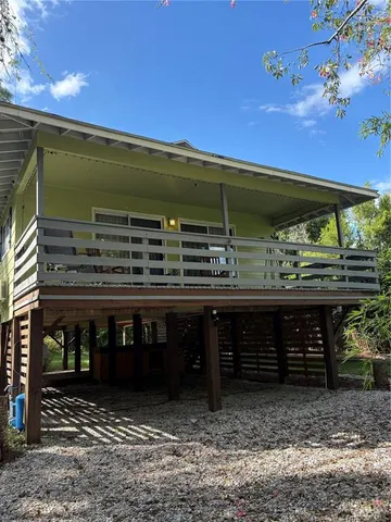 a view of house with outdoor space