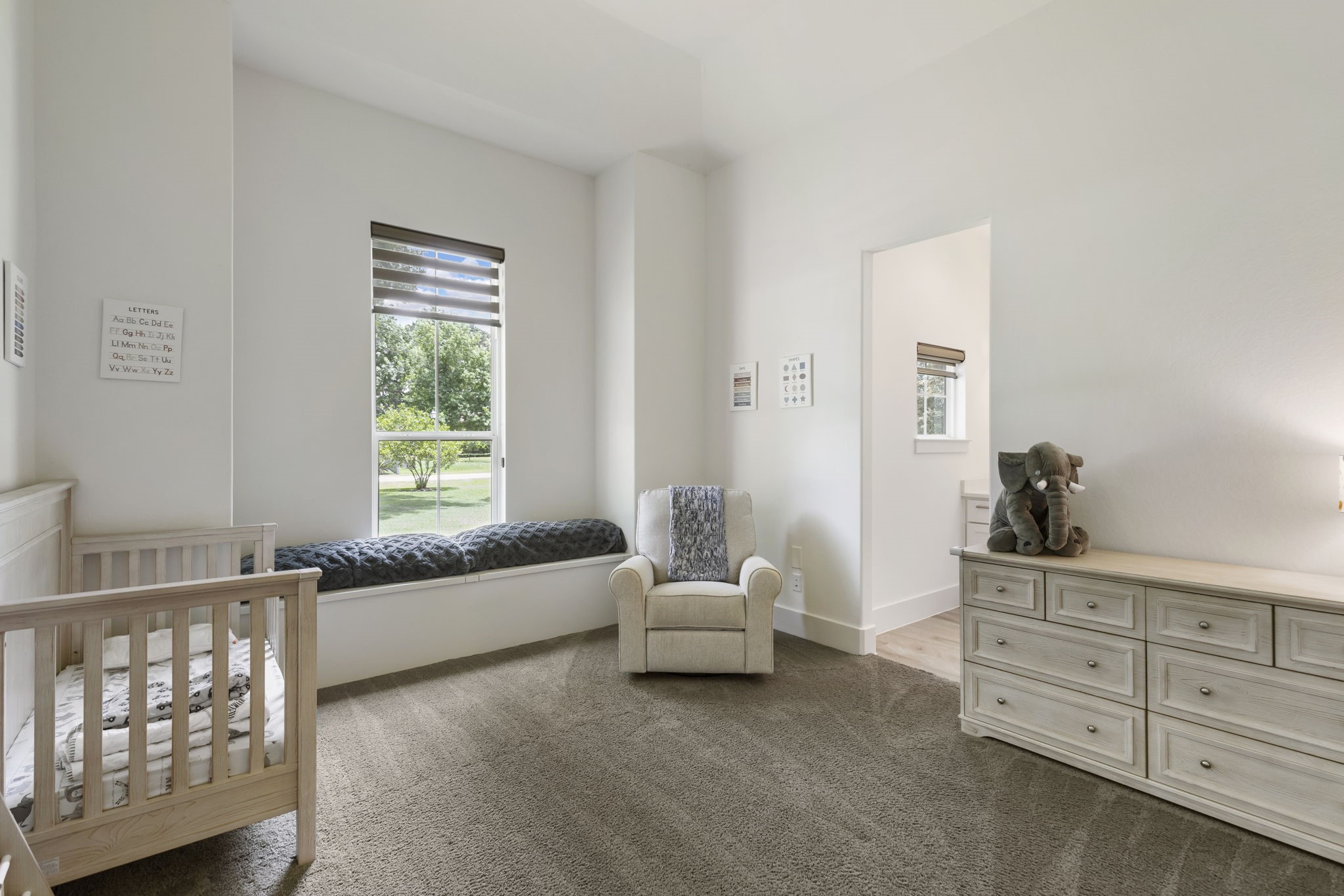 3918 Almond Court Spring, TX 77386 - Photo 23 of 42 a spacious bedroom with a bed and a window