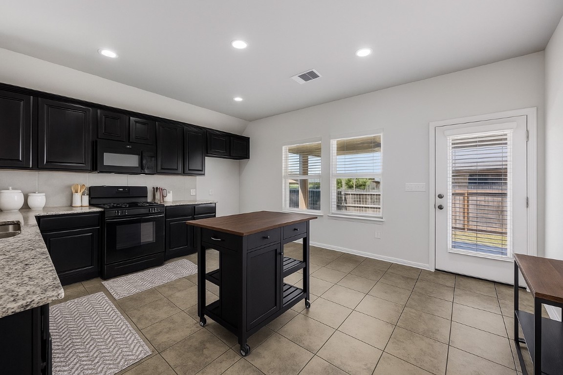 5836 Novaro Place Round Rock, TX 78665 - Photo 10 of 36 Big kitchen with plenty of room for larger island.