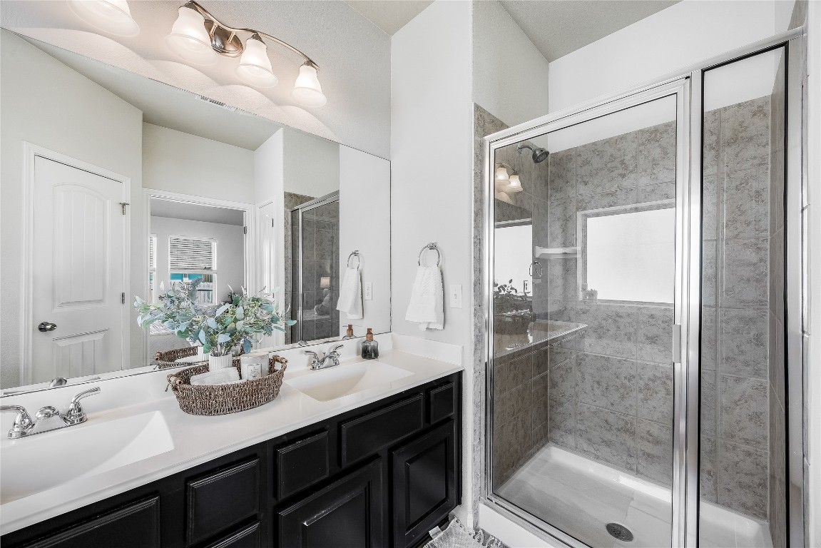 5836 Novaro Place Round Rock, TX 78665 - Photo 19 of 36 Double sinks and spacious shower.
