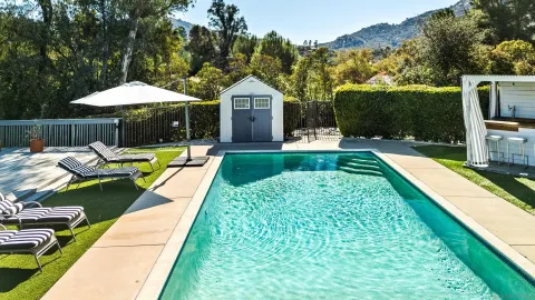 a view of an swimming pool and outdoor space
