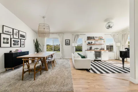 a view of a dining room with furniture