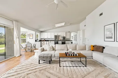 a living room with furniture and a table