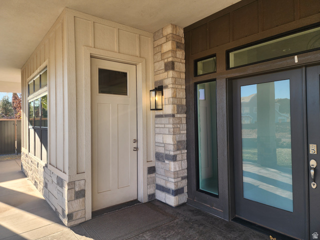 1283 North Gallen Road Santa Clara, UT 84765 - Photo 13 of 103 View of exterior entry featuring stone siding and board and batten siding. Separate Entry into the Office.