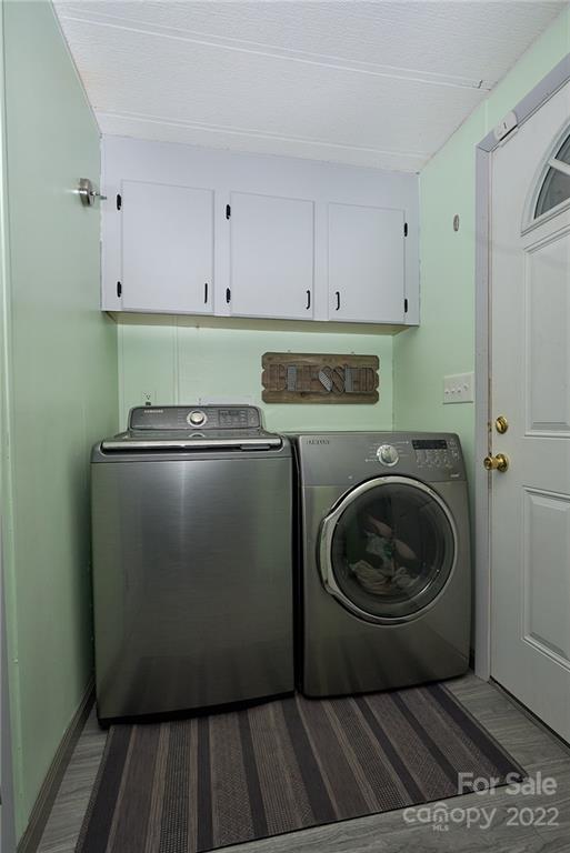 6781 Wright Road Kannapolis, NC 28081 - Photo 18 of 23 a utility room with wooden floor washer and dryer