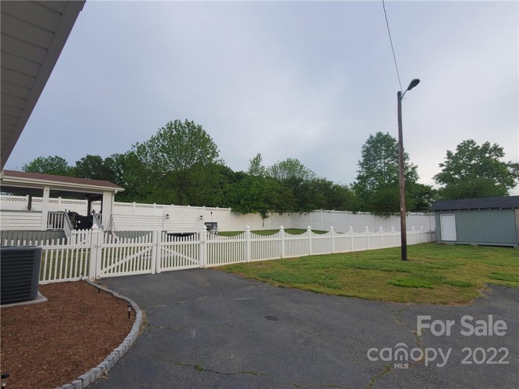 6781 Wright Road Kannapolis, NC 28081 - Photo 2 of 23 a view of a house with a yard