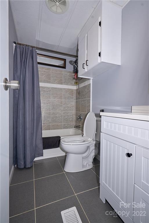 6781 Wright Road Kannapolis, NC 28081 - Photo 23 of 23 a bathroom with a toilet and a shower