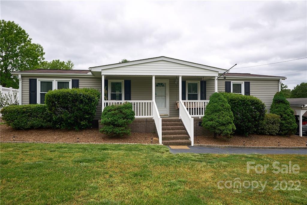 6781 Wright Road Kannapolis, NC 28081 - Photo 5 of 23 a view of a house with garden