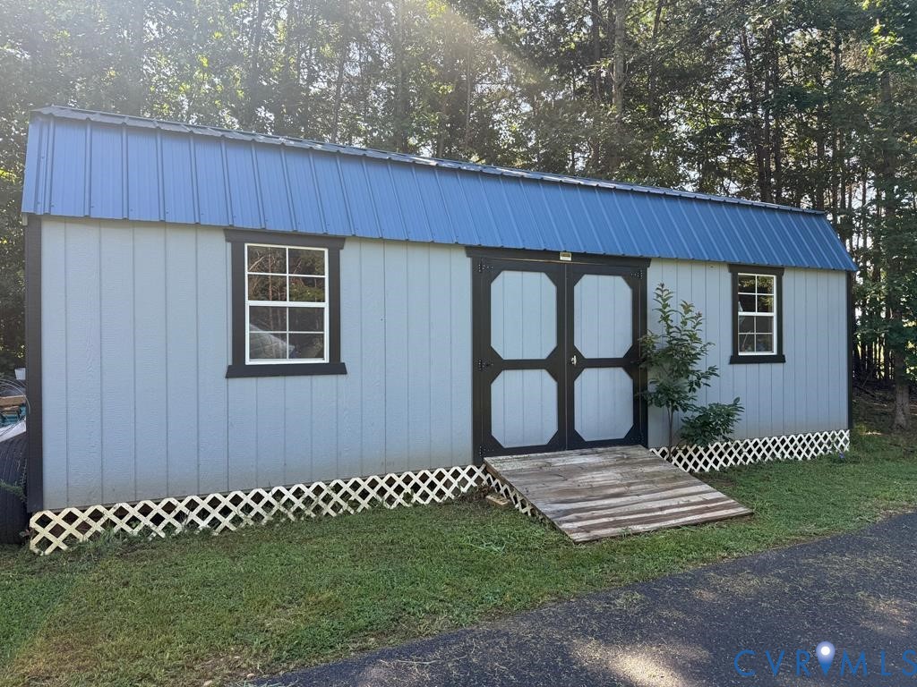 2095 Five Forks Road Pamplin, VA 23958 - Photo 22 of 23 a wooden house with outdoor space