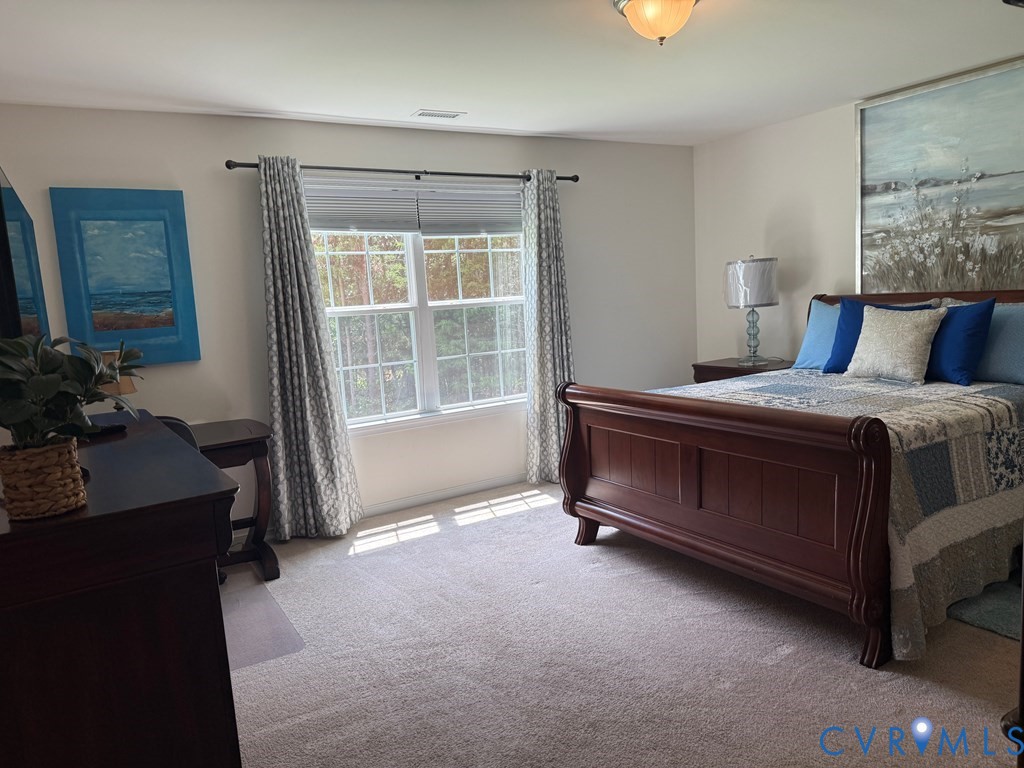 2095 Five Forks Road Pamplin, VA 23958 - Photo 9 of 23 a bedroom with a bed and a window