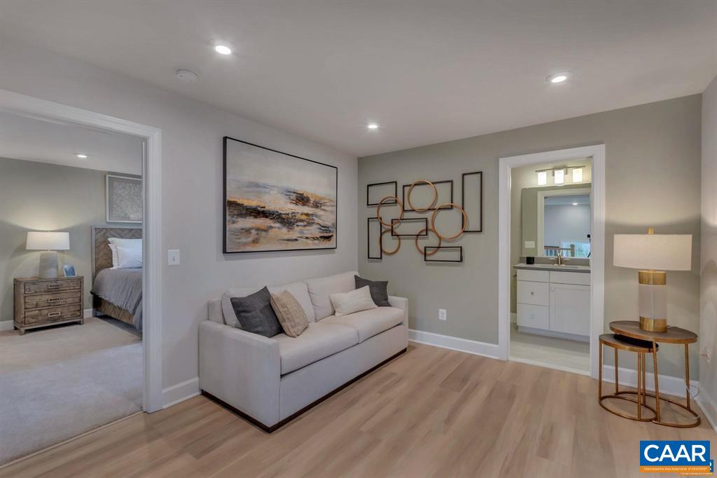 2837 Rambling Brook Lane Crozet, VA 22932 - Photo 14 of 24 a living room with furniture and a wooden floor