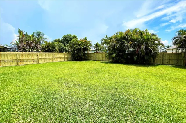 a view of a swimming pool and outdoor space