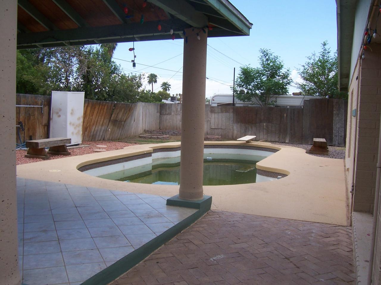 831 East Darrel Road Phoenix, AZ 85042 - Photo 2 of 8 Backyard of home with pool & ramada