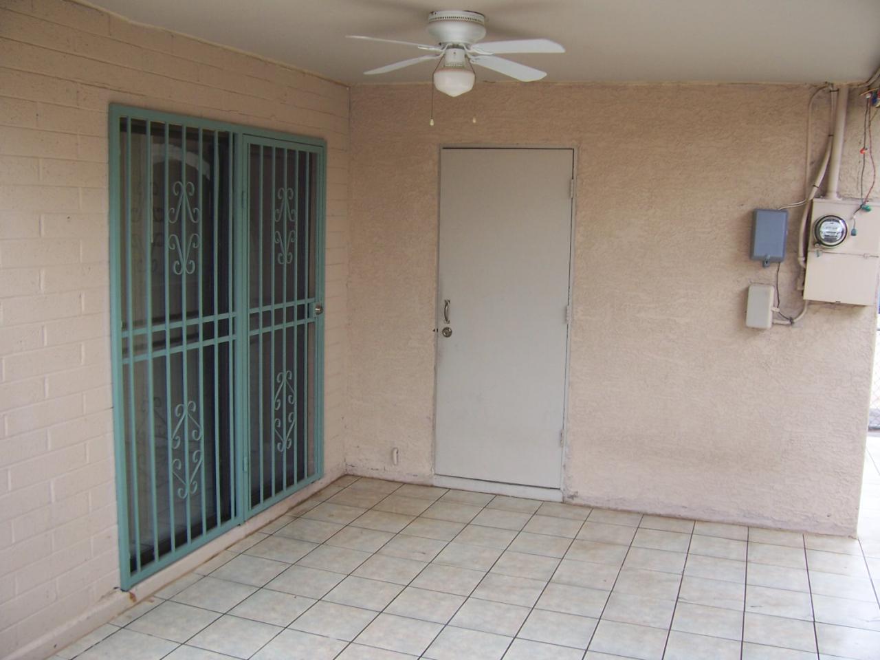 831 East Darrel Road Phoenix, AZ 85042 - Photo 6 of 8 Covered Patio with tile floor