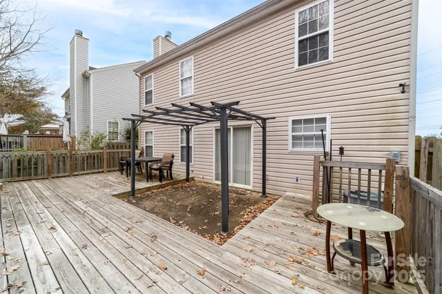 a view of a chairs on the roof deck