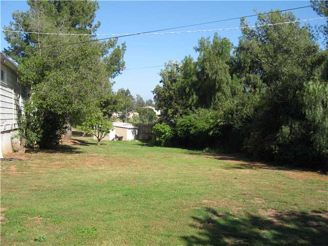 11557 Rocoso Road Lakeside, CA 92040 - Photo 9 of 10 Large side yard - great place for soccer, horse shoes, lawn bowling - family fun !!