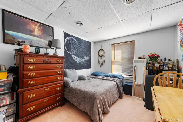 a kitchen with stainless steel appliances a stove a sink dishwasher and a refrigerator