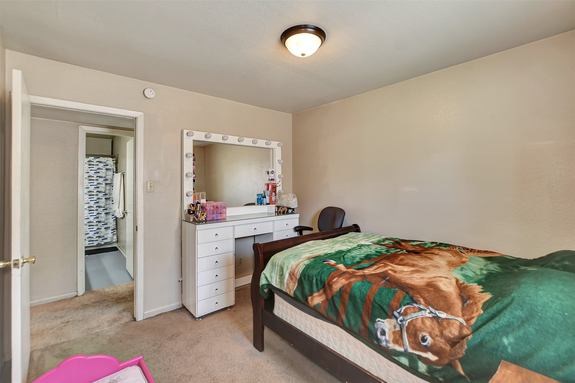 1920 6th Street Hempstead, TX 77445 - Photo 20 of 29 Well-sized secondary bedroom, perfect for family, guests, or a home office.