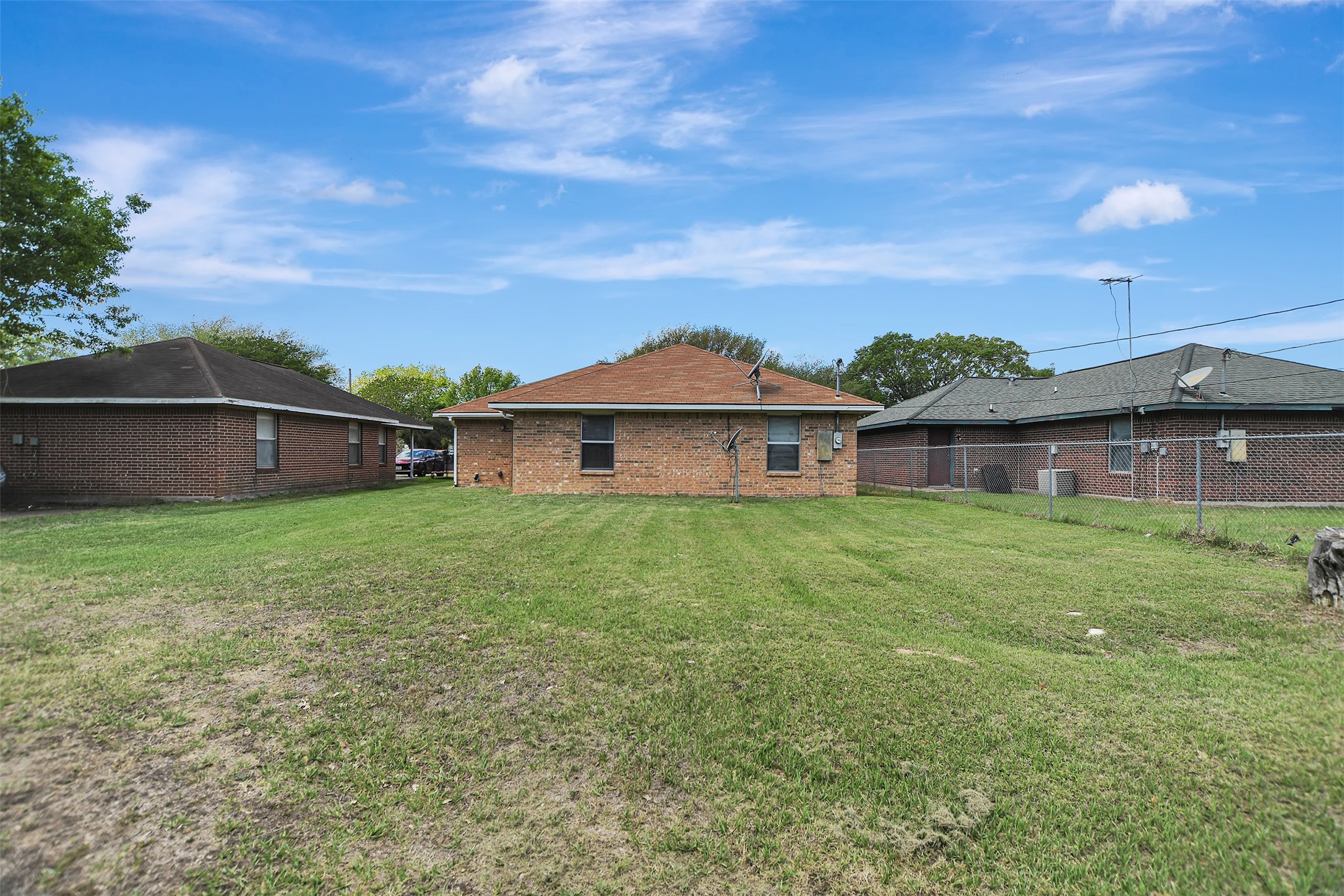 1920 6th Street Hempstead, TX 77445 - Photo 26 of 29 Large, open backyard with plenty of space to create your ideal outdoor setup—endless potential for entertaining, gardening, or future improvements.