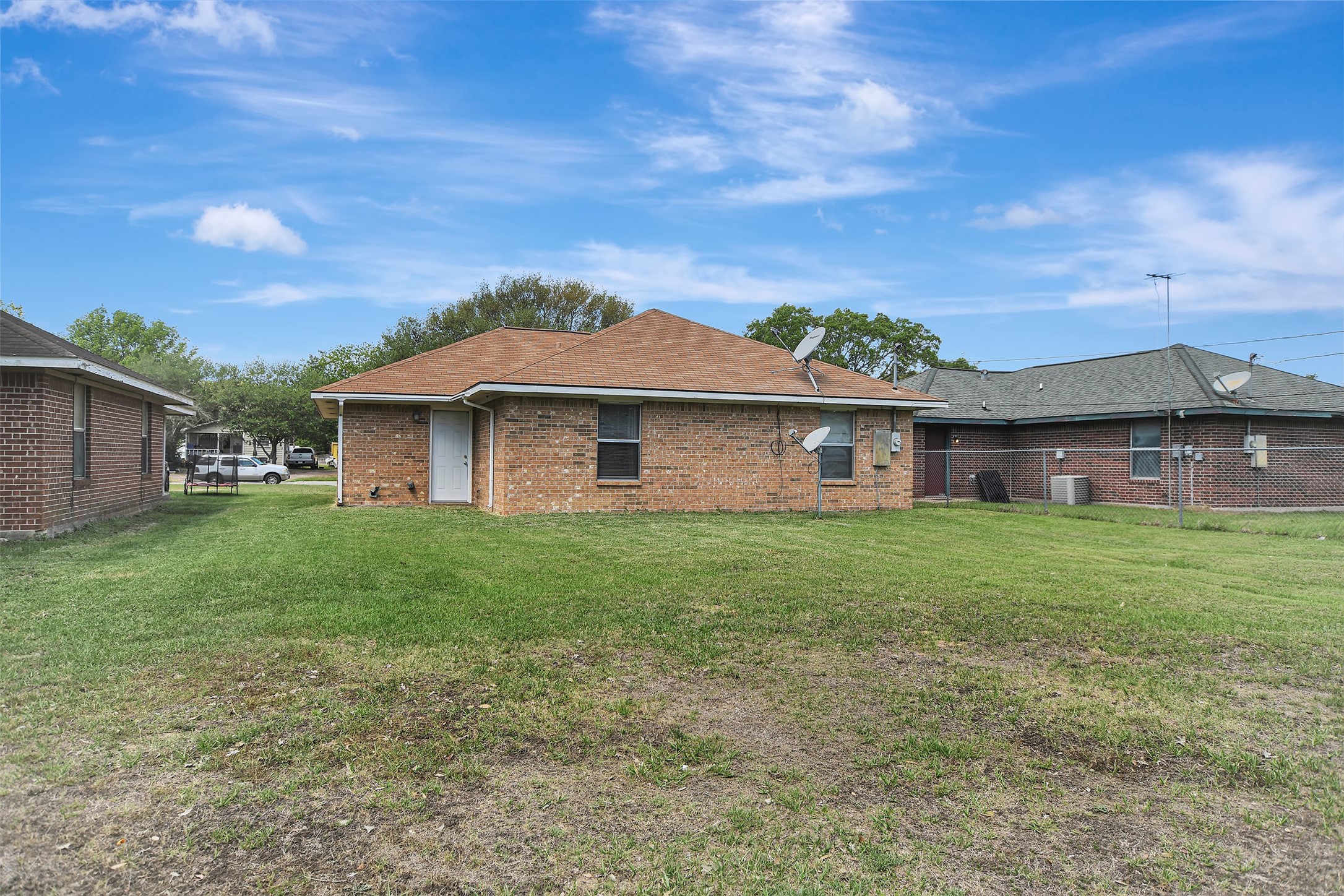 1920 6th Street Hempstead, TX 77445 - Photo 27 of 29 Large, open backyard with plenty of space to create your ideal outdoor setup—endless potential for entertaining, gardening, or future improvements.