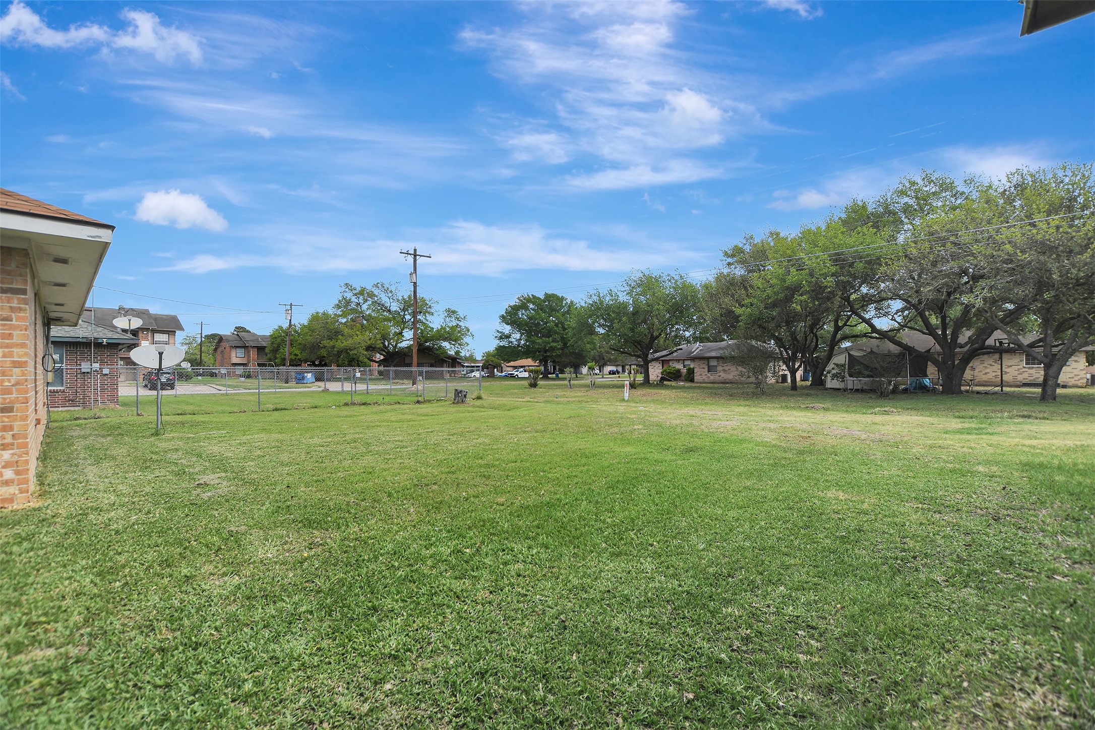 1920 6th Street Hempstead, TX 77445 - Photo 29 of 29 Large, open backyard with plenty of space to create your ideal outdoor setup—endless potential for entertaining, gardening, or future improvements.