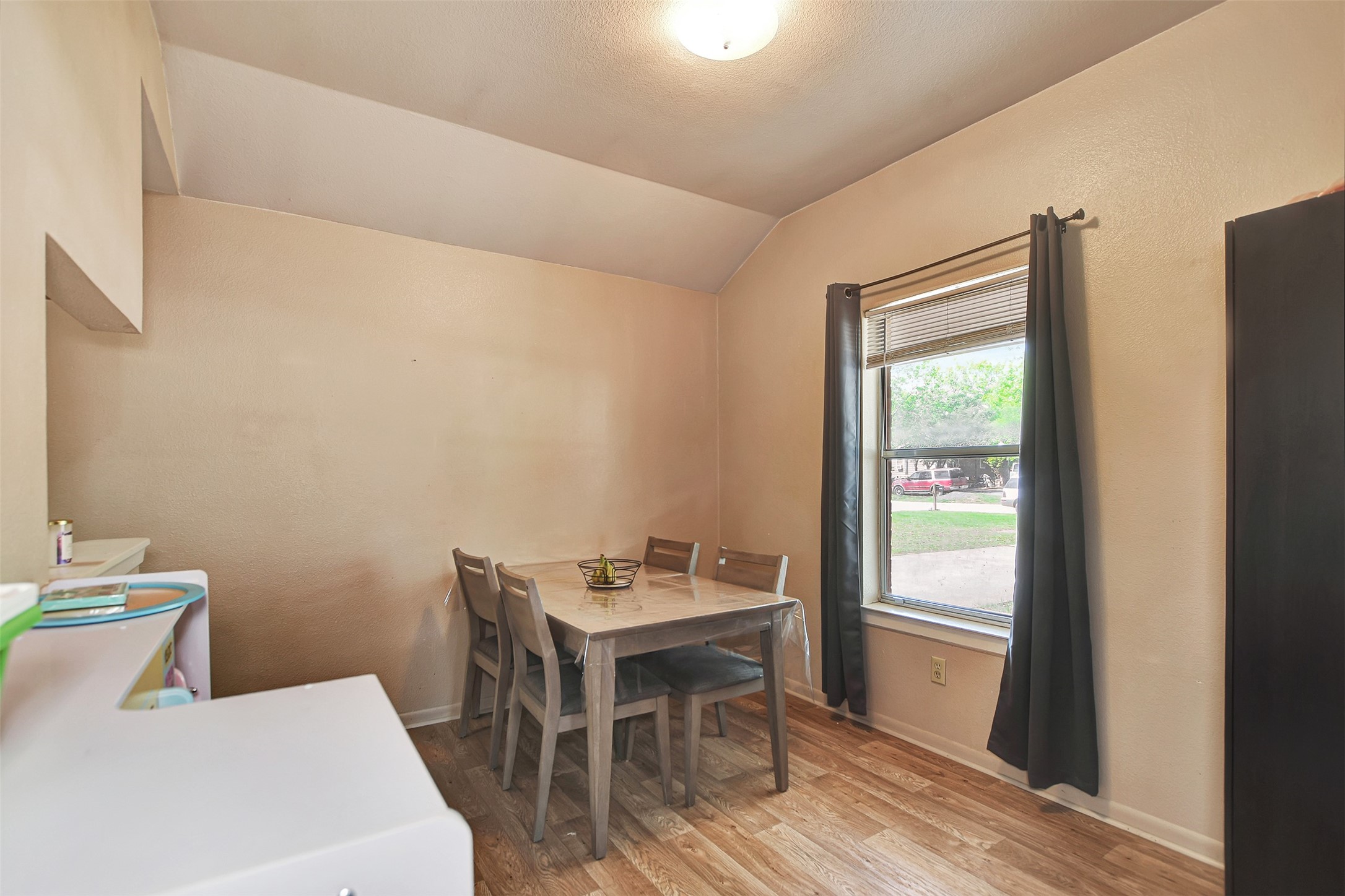 1920 6th Street Hempstead, TX 77445 - Photo 10 of 29 Open dining space conveniently located between the living room and kitchen—perfect for gatherings and easy meal service.