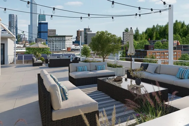 a view of a patio with couches chairs dining table and chairs