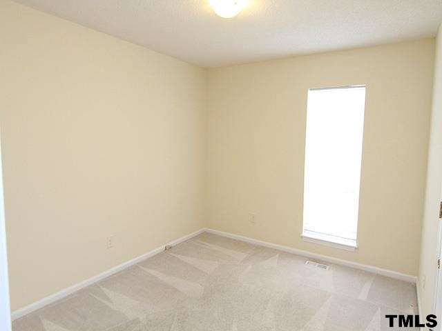 3605 Christine Court Raleigh, NC 27604 - Photo 7 of 12 a view of a small space with a window