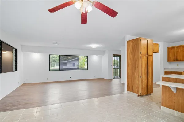 a kitchen with stainless steel appliances a sink stove and cabinets