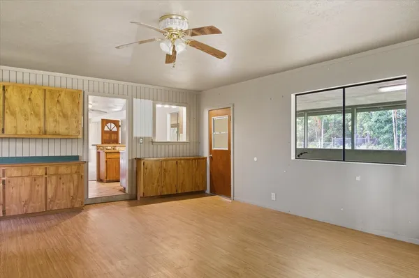 a view of a kitchen with furniture and a kitchen