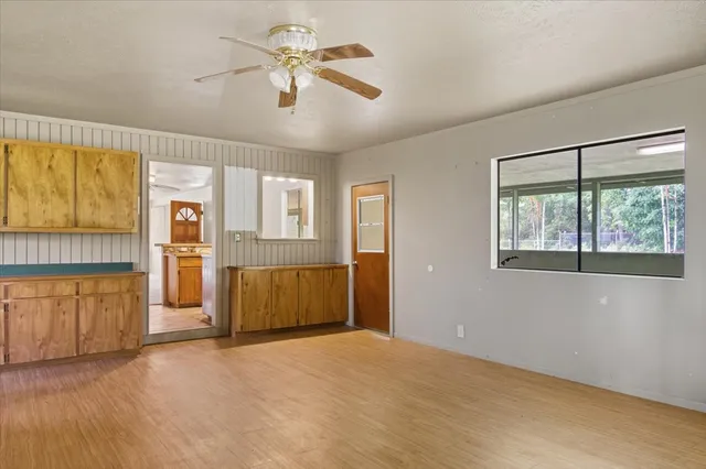 a view of a kitchen with furniture and a kitchen