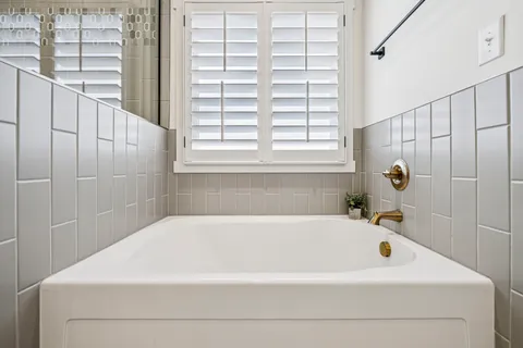 a room with furniture and a flat screen tv