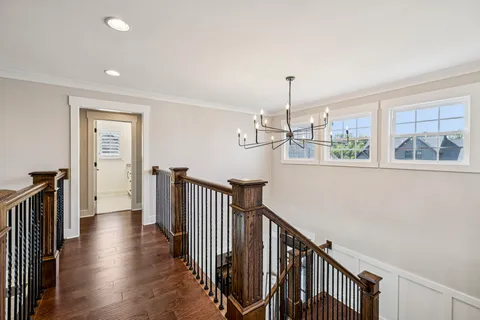 a front view of a house with a yard and porch