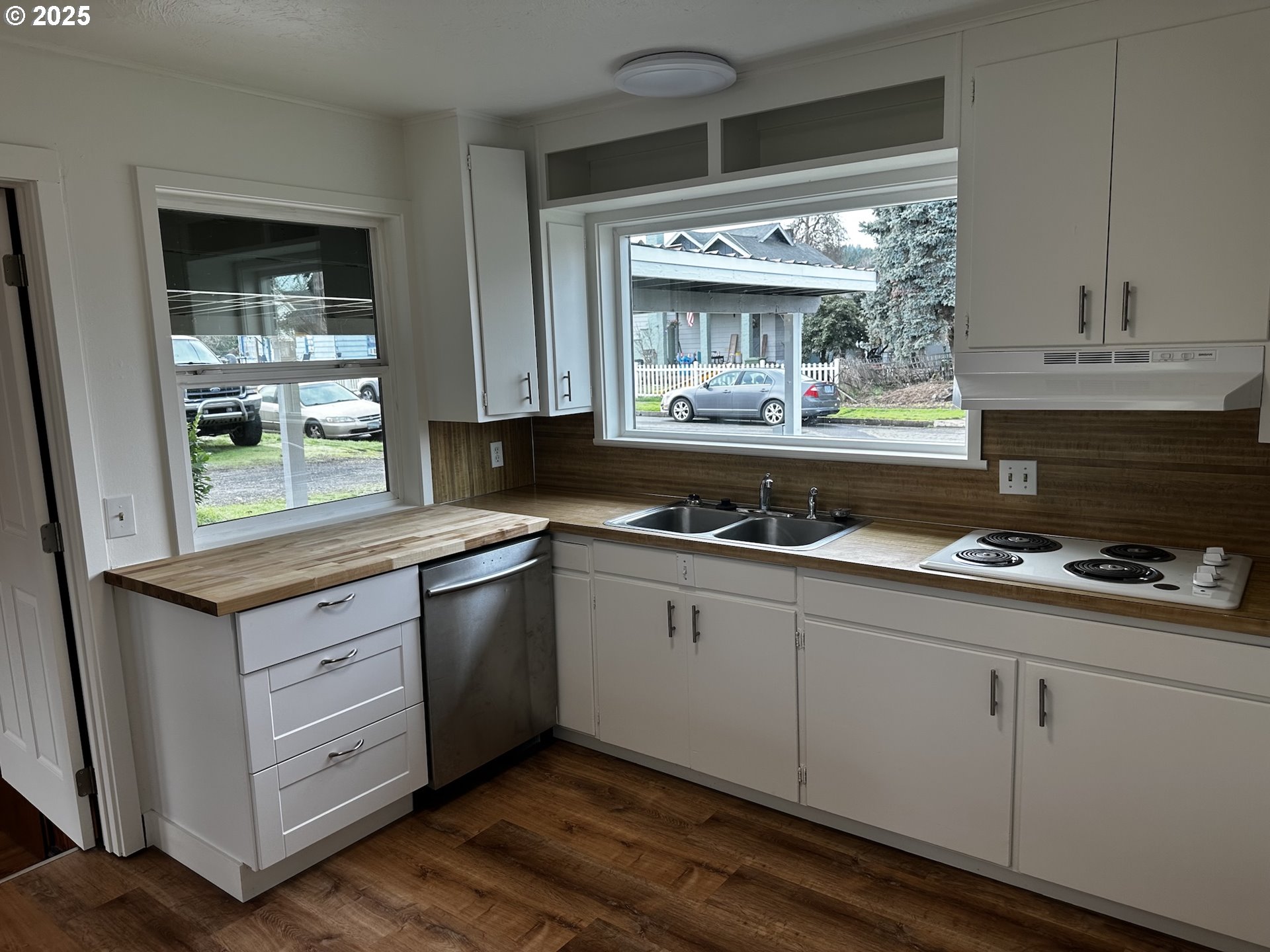 818 South 1st Street Cottage Grove, OR 97424 - Photo 14 of 22 a kitchen with stainless steel appliances granite countertop a stove and a sink