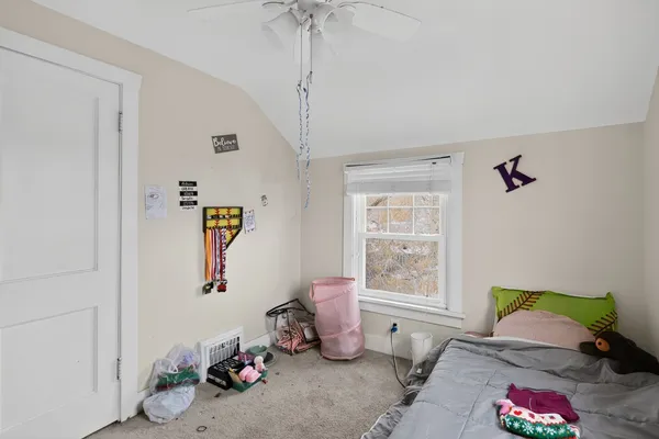 a front view of a house with a garage