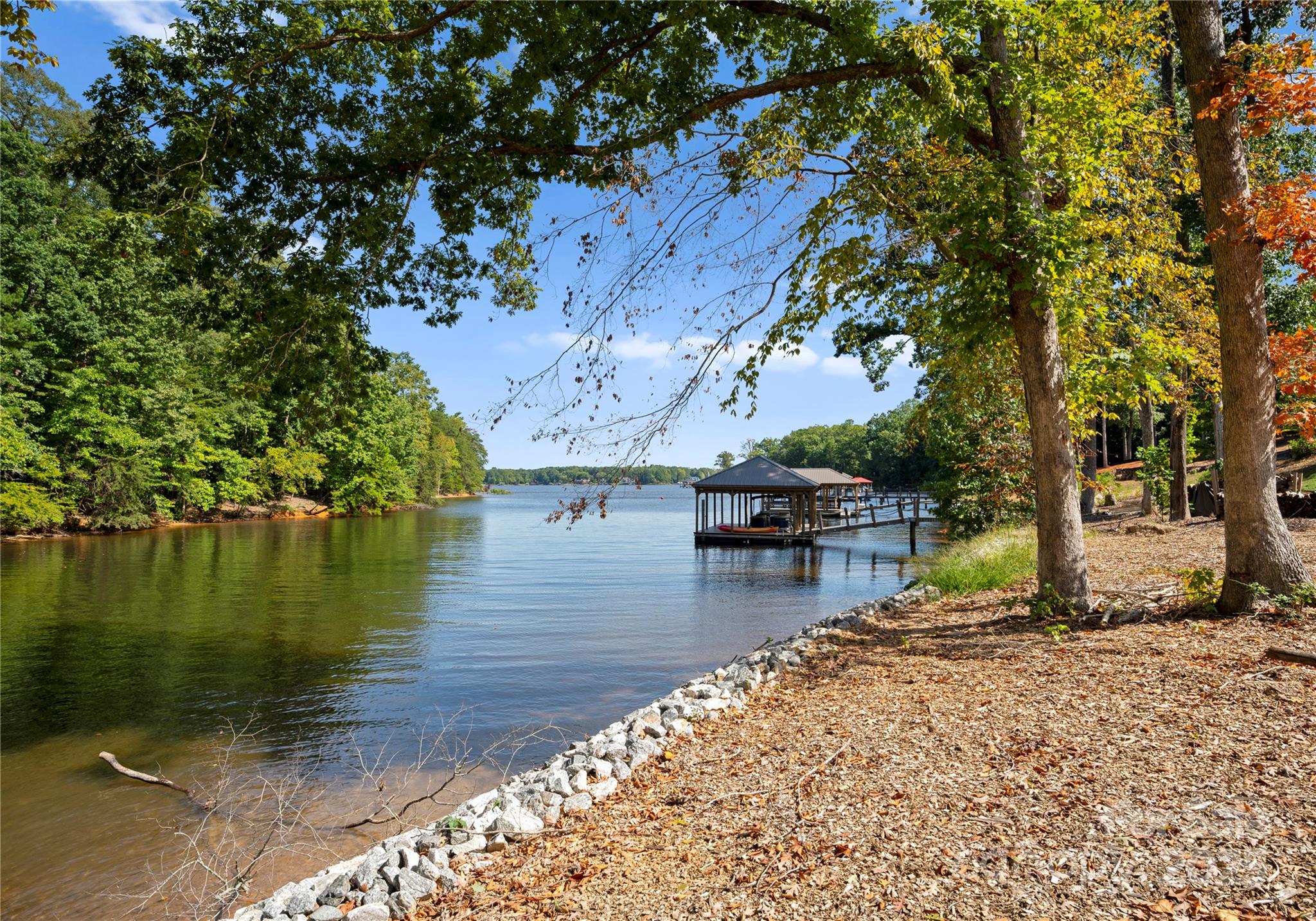 4218 Sigmon Cove Lane, Unit 6 Terrell, NC 28682 - Photo 11 of 39 a view of a lake with a house in the background