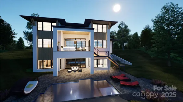 a living room with furniture a rug and white walls