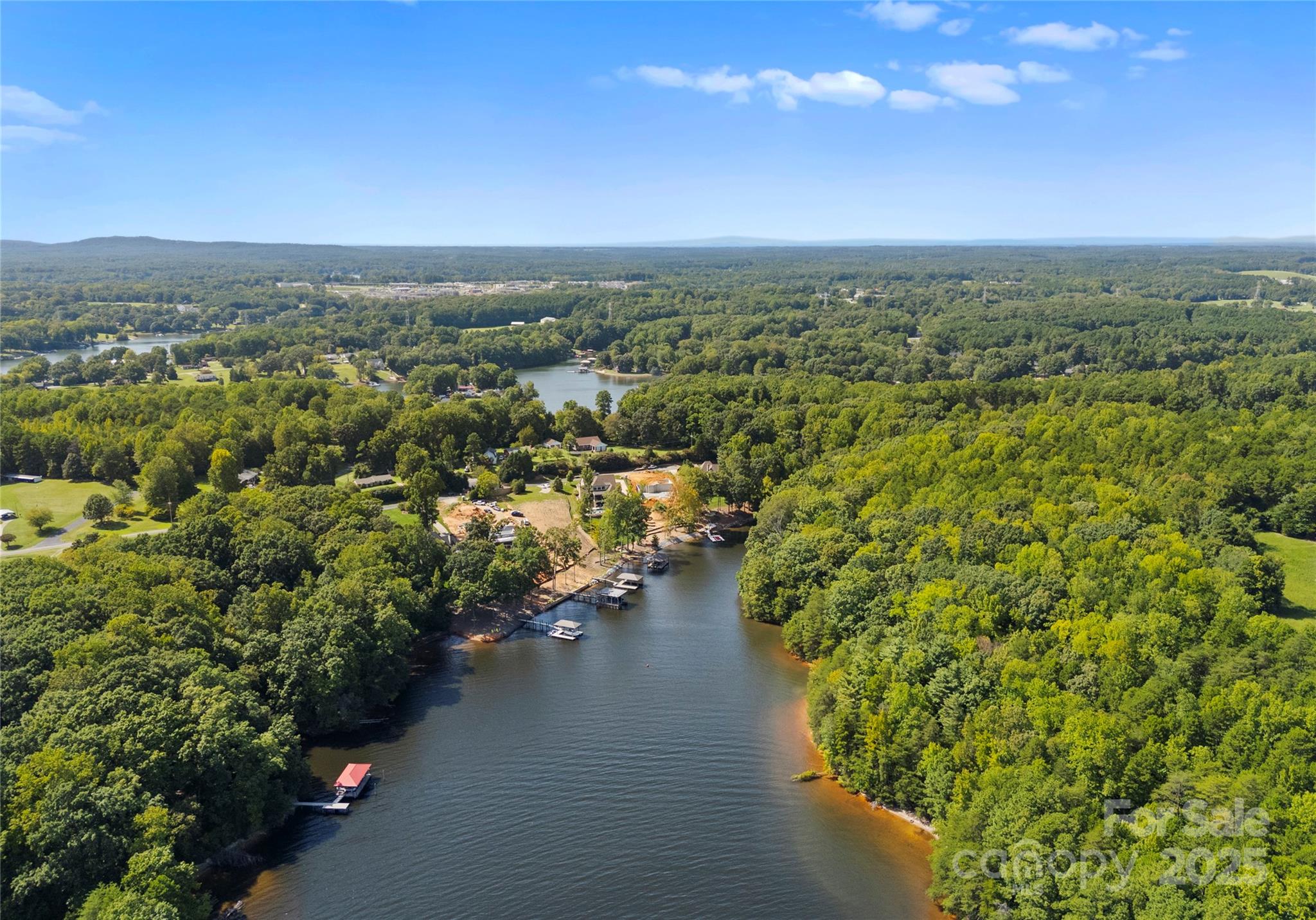 4218 Sigmon Cove Lane, Unit 6 Terrell, NC 28682 - Photo 7 of 39 an aerial view of city and lake