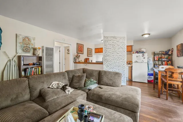 a living room with furniture and a couch