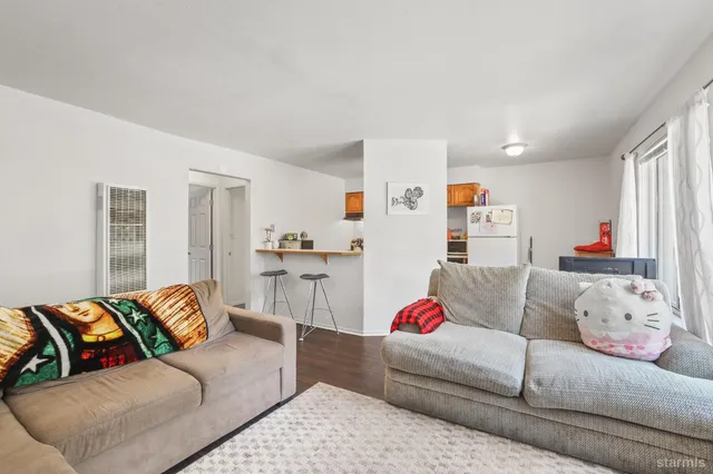 a living room with furniture and a couch