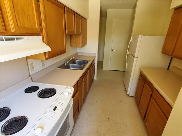 a view of kitchen and utility room