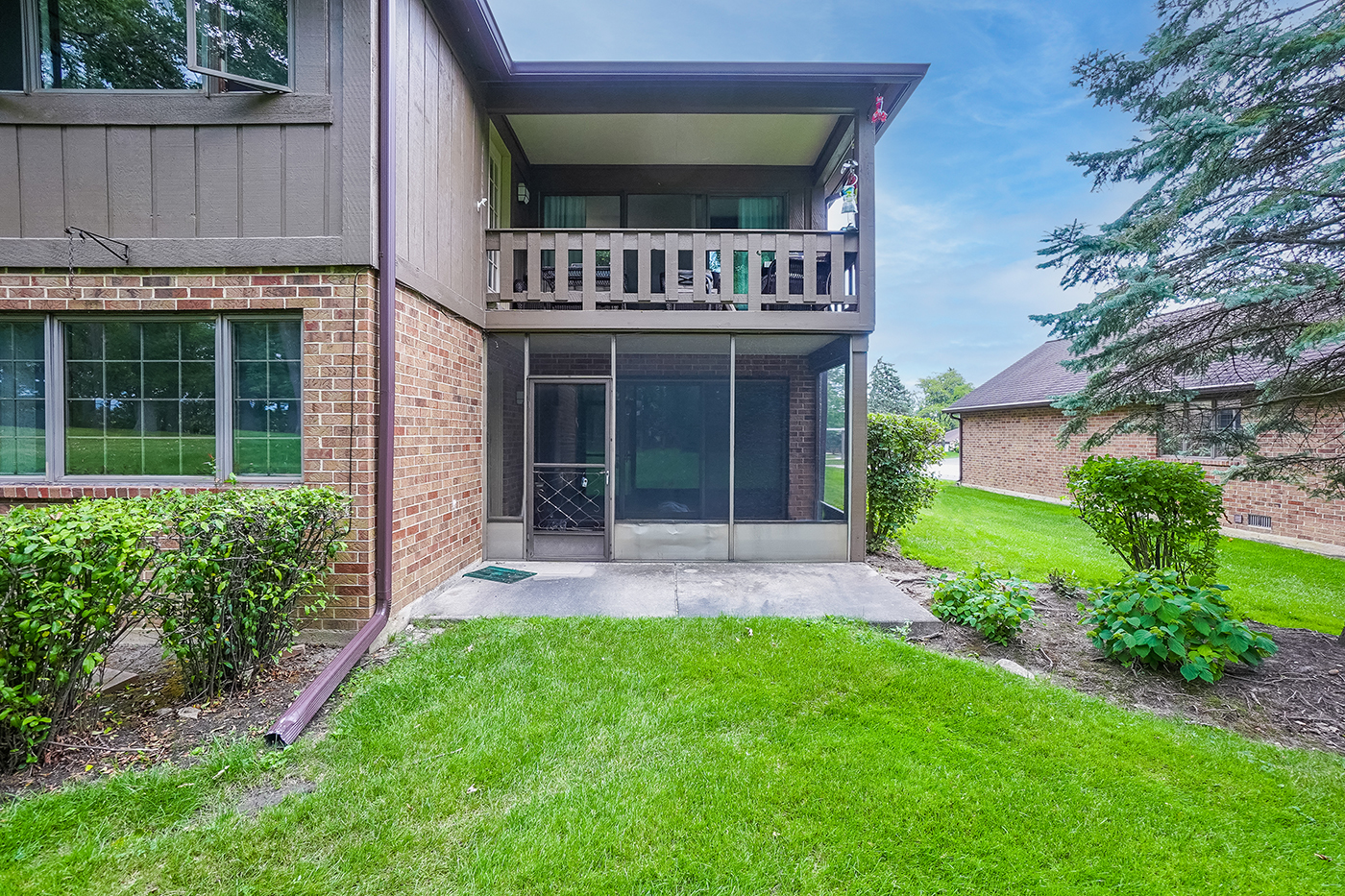 13222 South Oak Ridge Trail, Unit 1A Palos Heights, IL 60463 - Photo 19 of 21 a view of an house with backyard space and garden