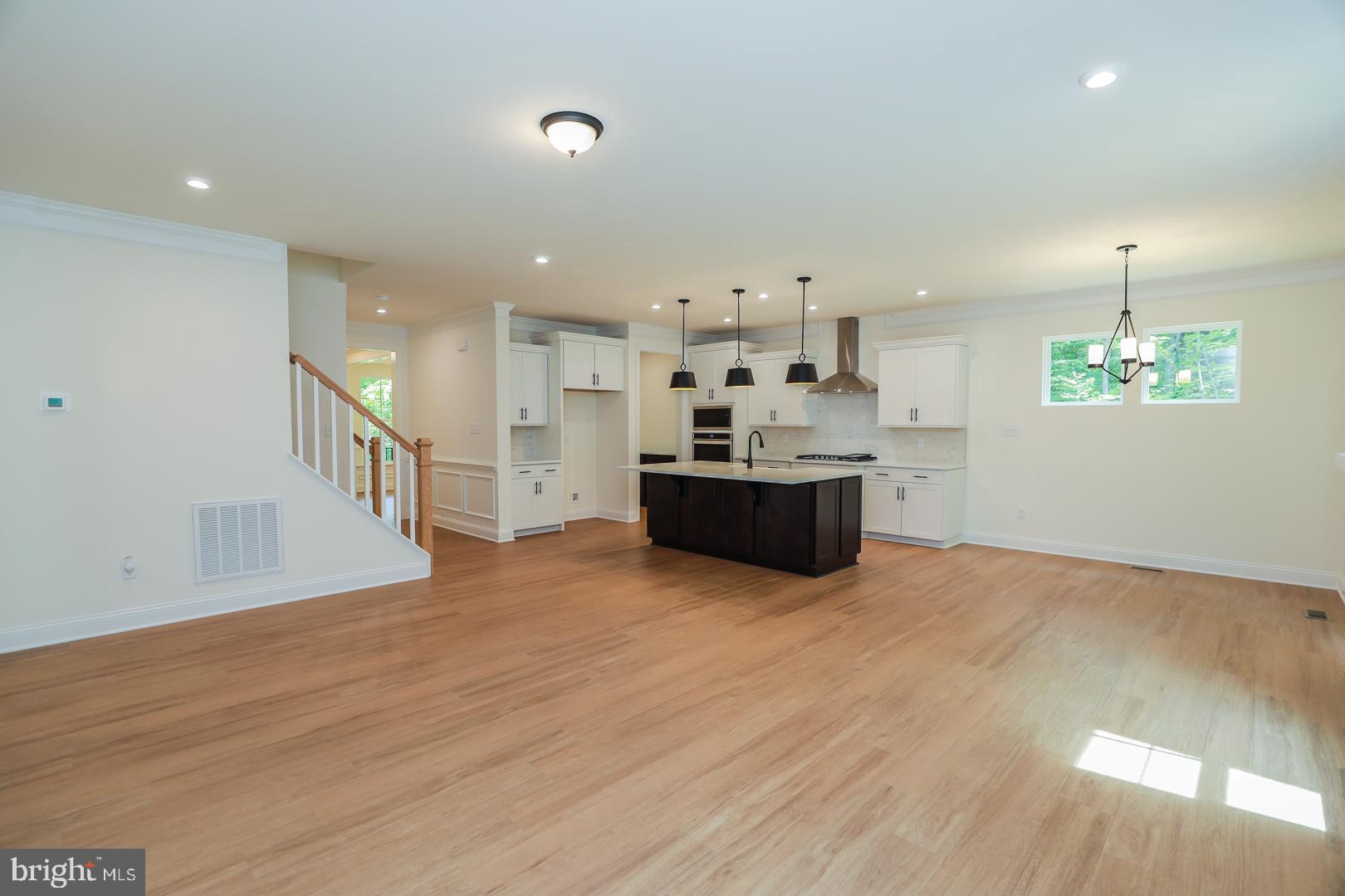 3186 Three Chopt Road Gum Spring, VA 23065 - Photo 8 of 30 Kitchen, Family Room, and Breakfast Area