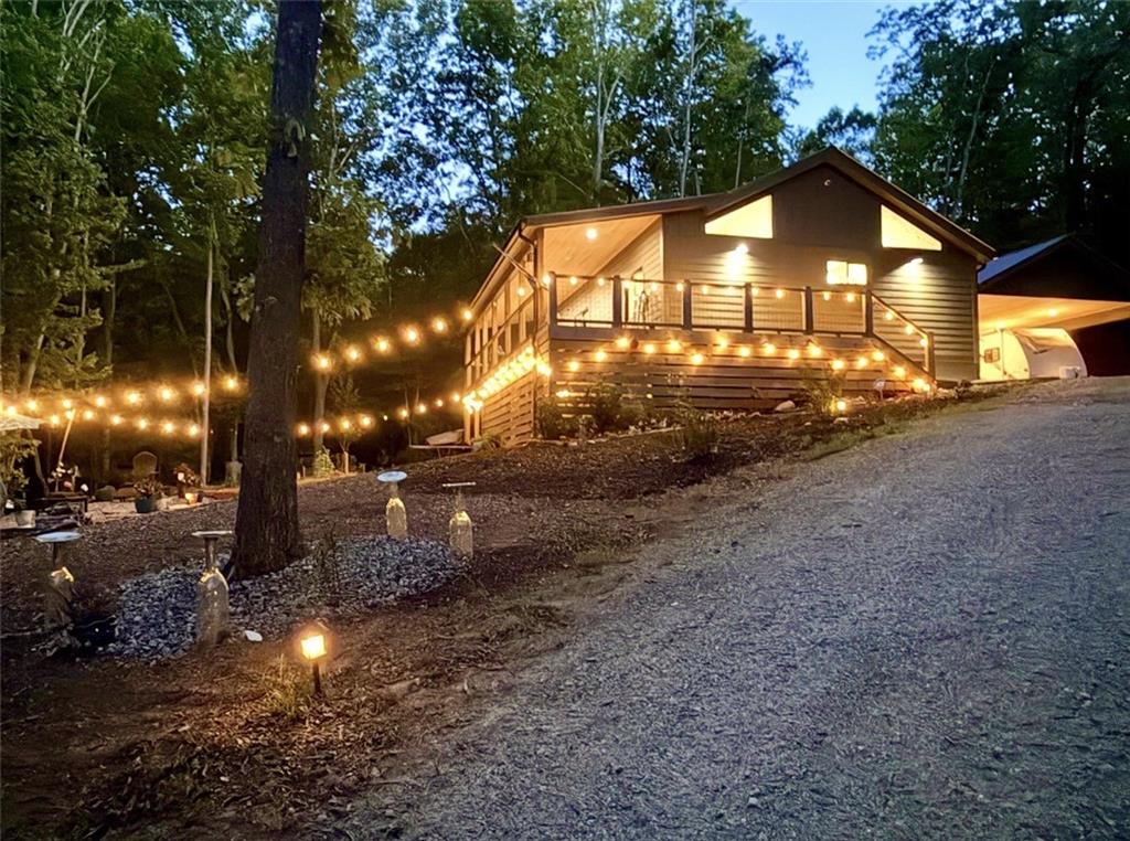191 Oakwood Road Blairsville, GA 30512 - Photo 2 of 43 a view of a yard in front of the house