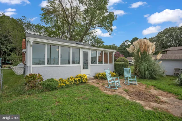 a house view with a garden space
