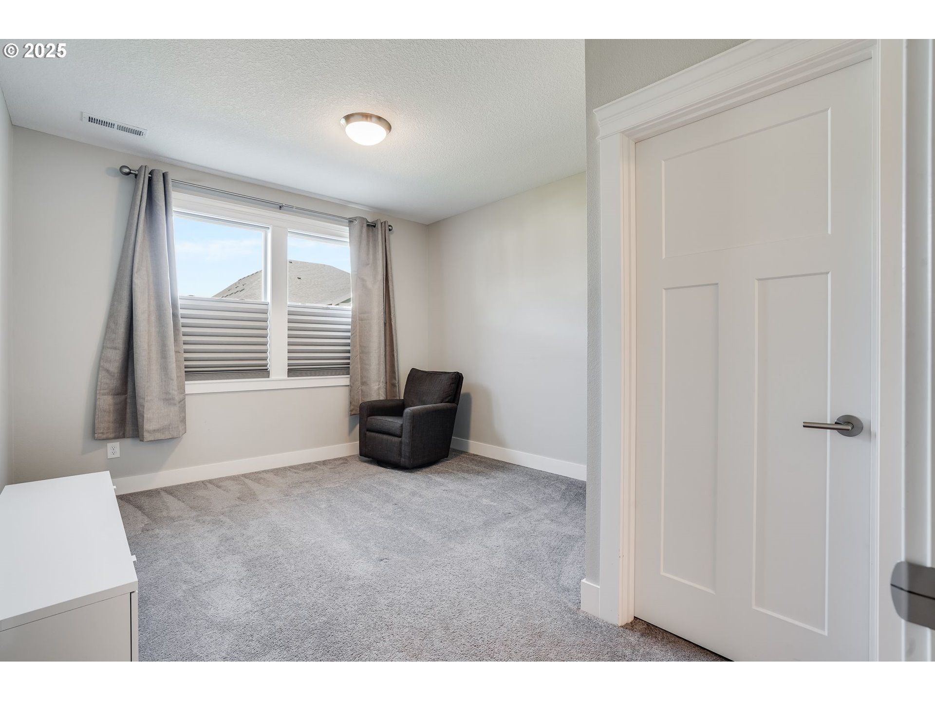 1709 South 43rd Place Ridgefield, WA 98642 - Photo 11 of 24 a view of an empty room with a window